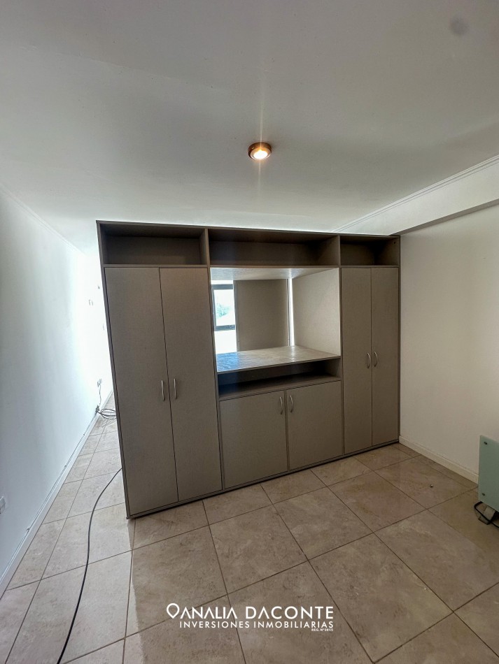 Monoambiente en edificio moderno con cochera